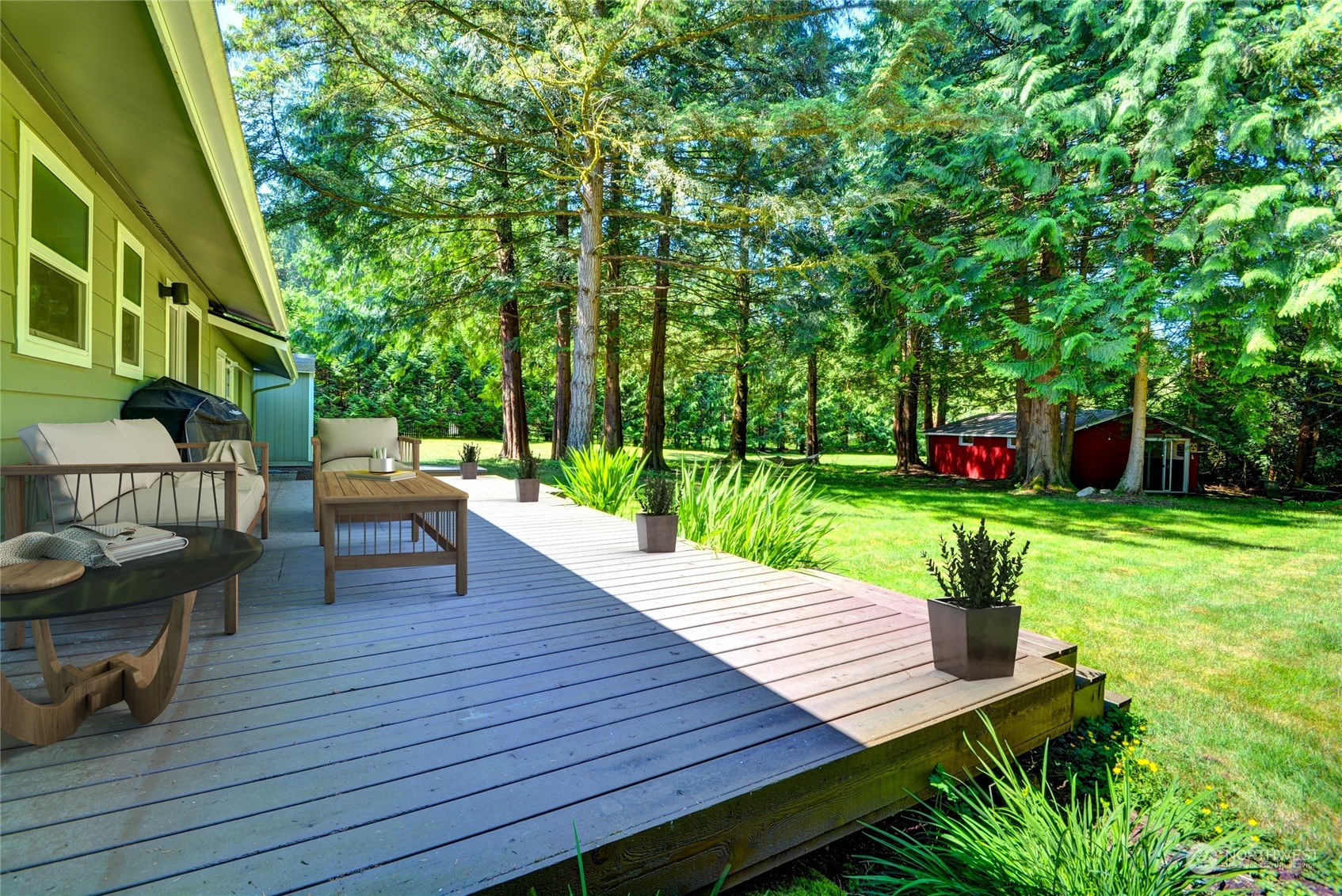 4608 Strumme Road Bothell, WA 98012 - Photo 17 of 30 a patio with table and chairs