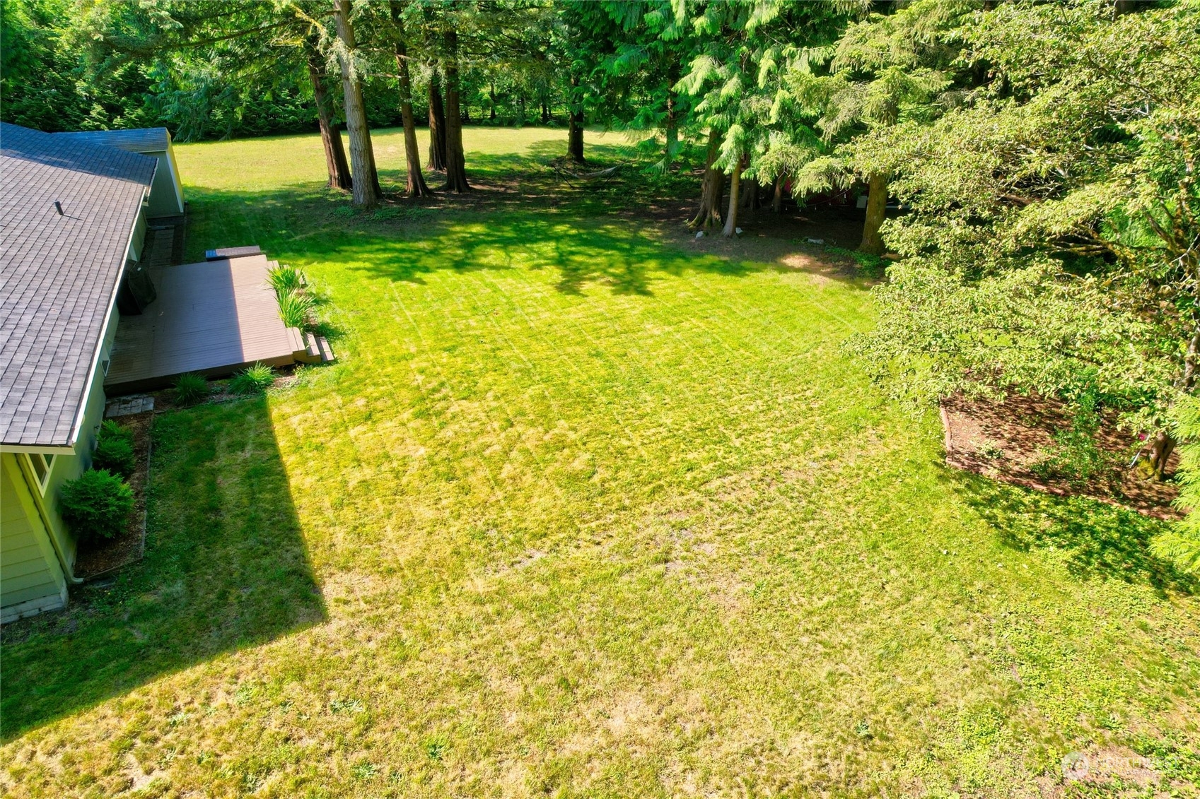 4608 Strumme Road Bothell, WA 98012 - Photo 19 of 30 a view of a yard with an outdoor space