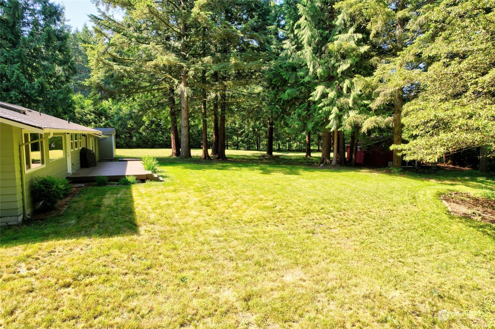 4608 Strumme Road Bothell, WA 98012 - Photo 20 of 30 a view of a swimming pool with a patio