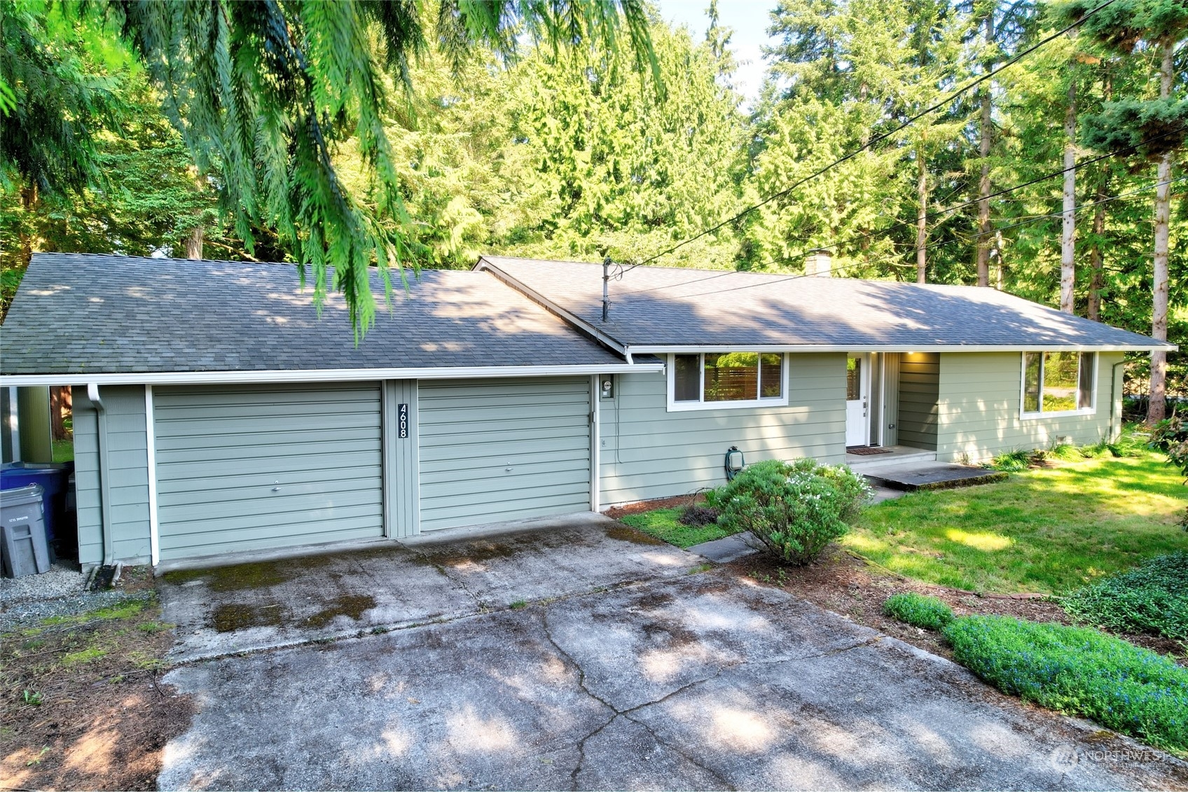 4608 Strumme Road Bothell, WA 98012 - Photo 2 of 30 a view of a house with a yard and tree