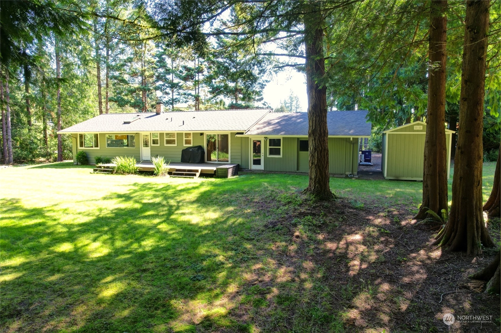 4608 Strumme Road Bothell, WA 98012 - Photo 22 of 30 a view of a house with a yard