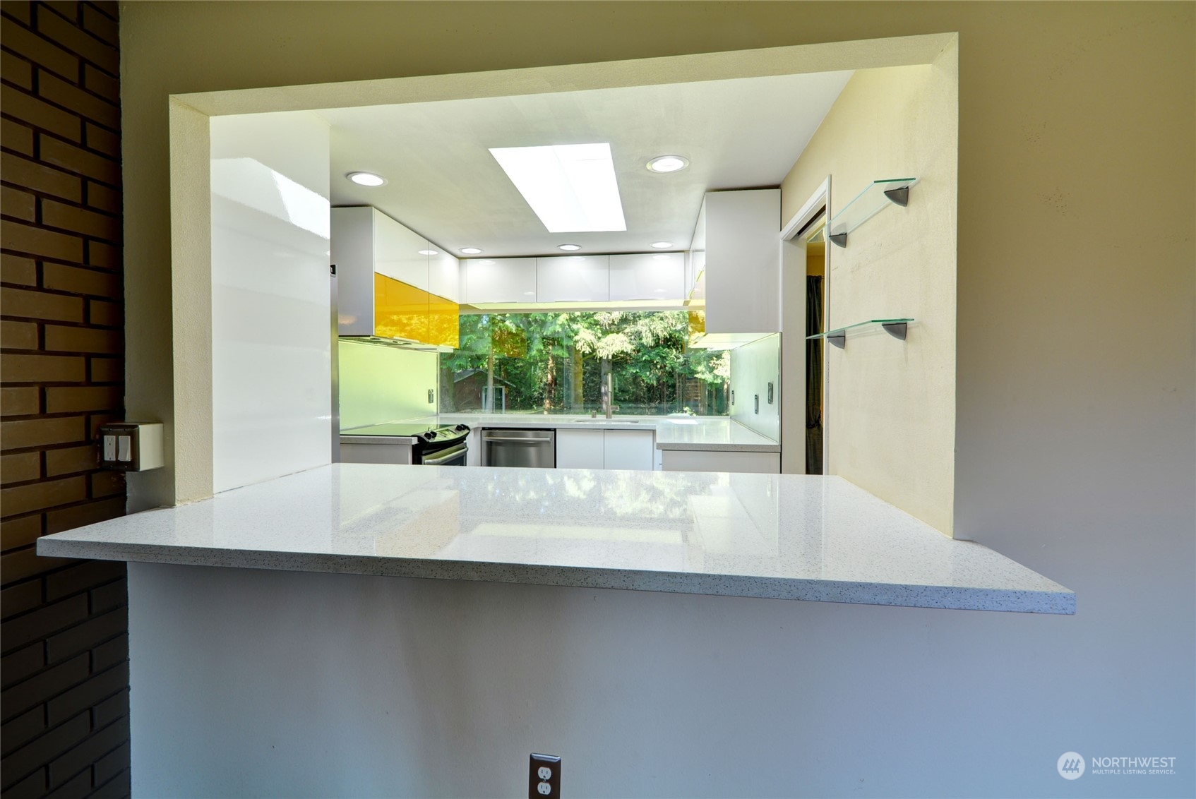 4608 Strumme Road Bothell, WA 98012 - Photo 8 of 30 a large white kitchen with a large window