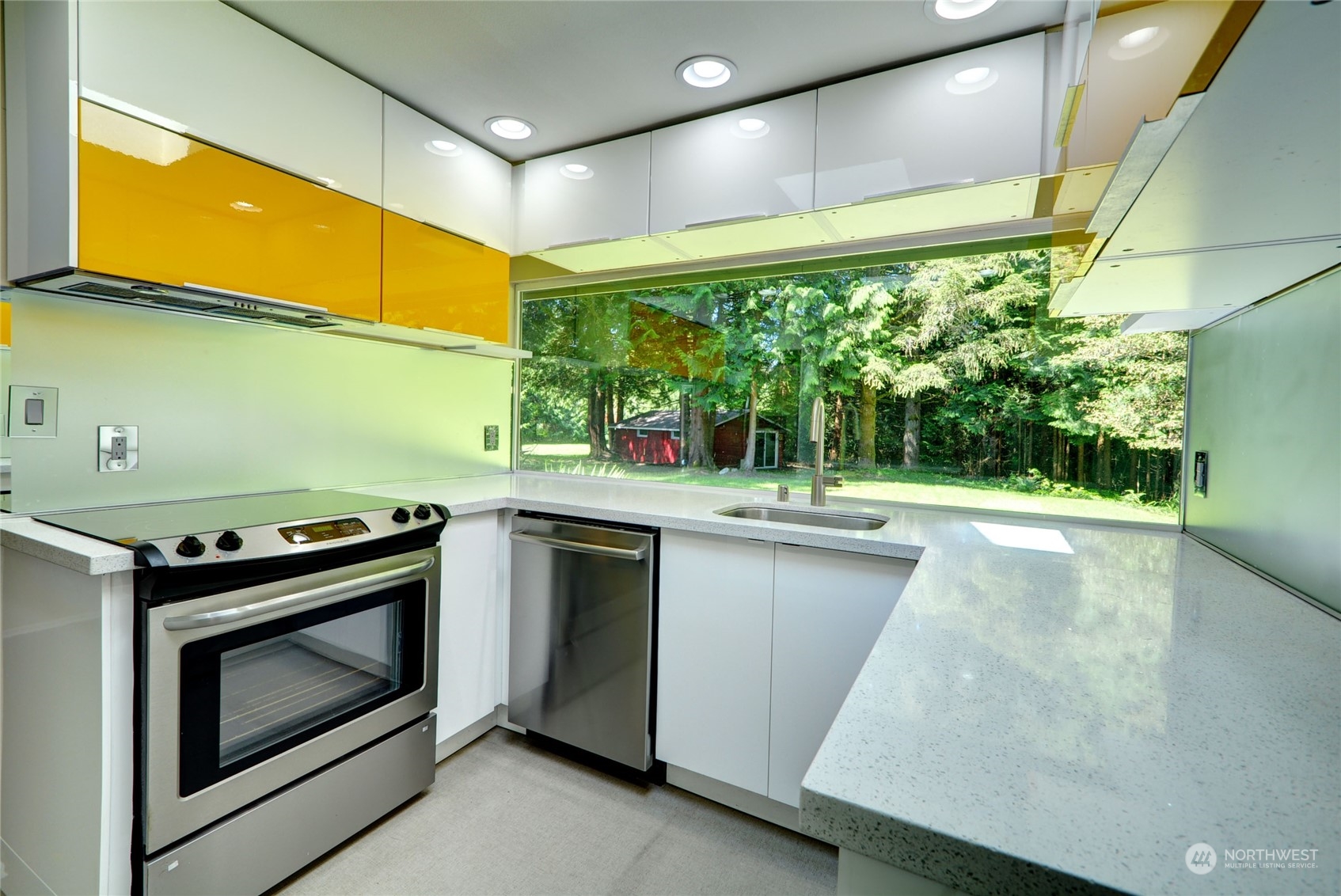 4608 Strumme Road Bothell, WA 98012 - Photo 10 of 30 a kitchen with a stove and a sink