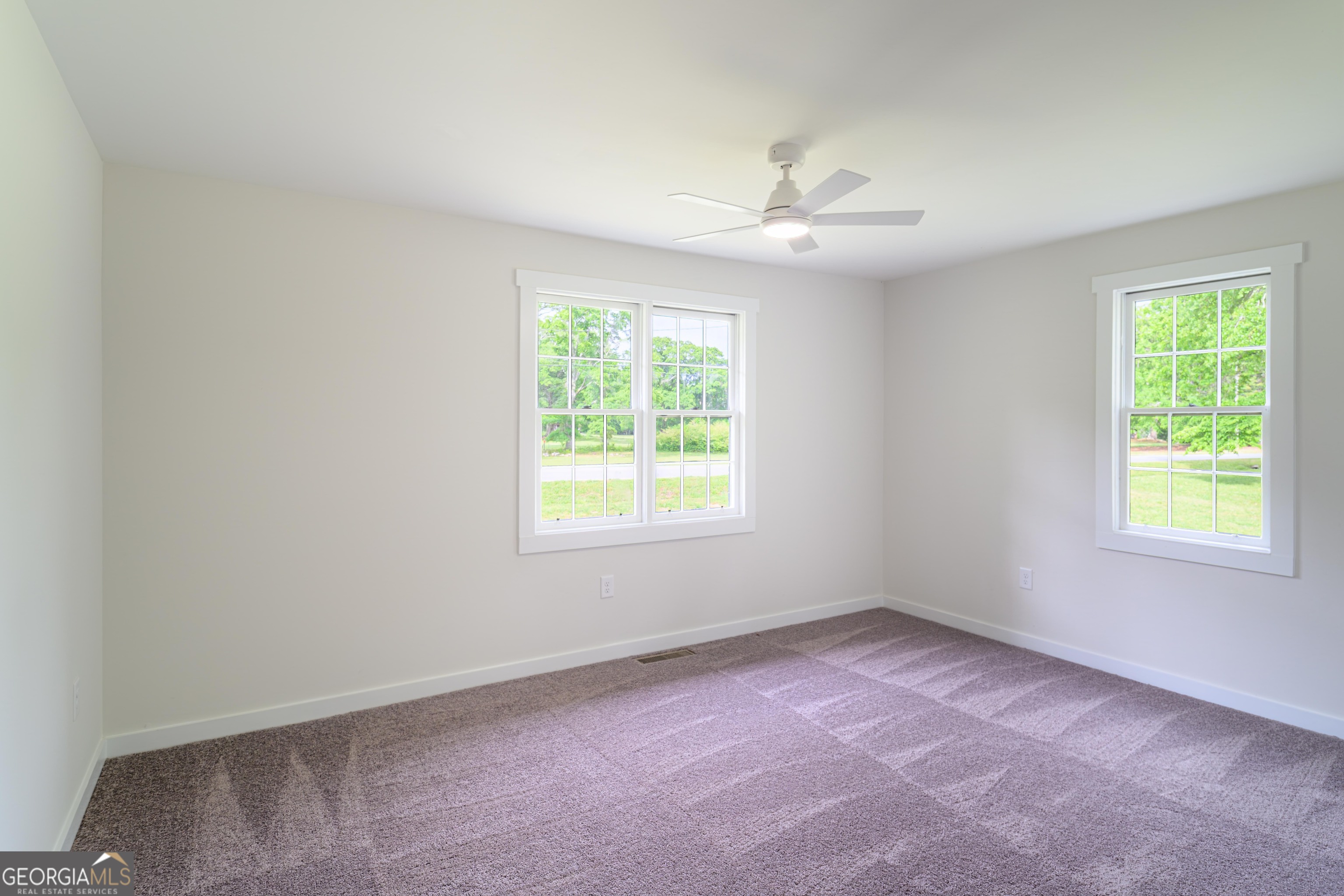 418 Lamb Road Moreland, GA 30259 - Photo 22 of 32 an empty room with a window