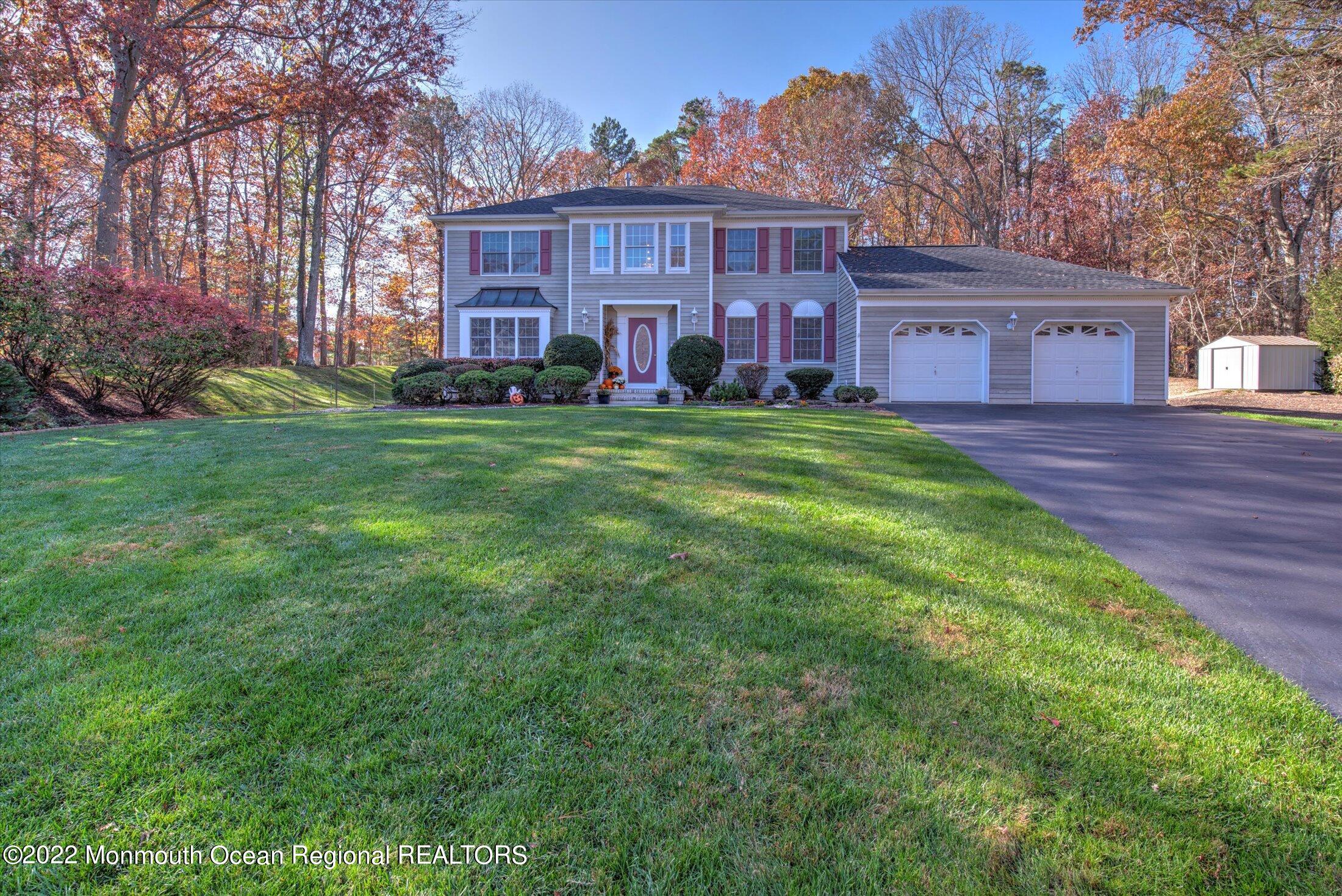 9 Shepherds Way Jackson, NJ 08527 - Photo 1 of 1 a view of a big house with a big yard and large trees