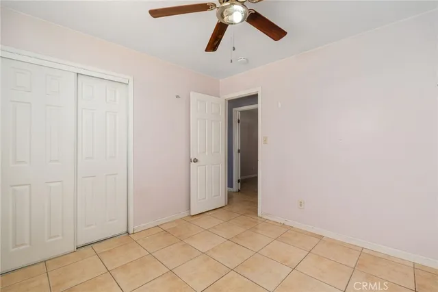 a bathroom with a sink and mirror with toilet