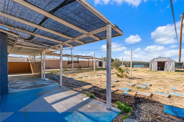 a view of a backyard of a house