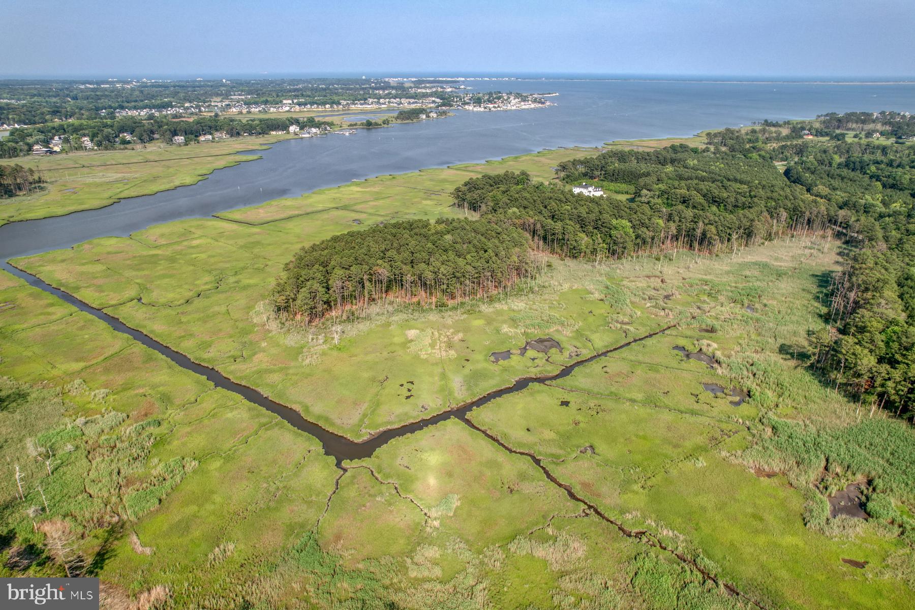 22253 Waterview Road, Unit 4 Lewes, DE 19958 - Photo 3 of 28 a view of an ocean and a mountain