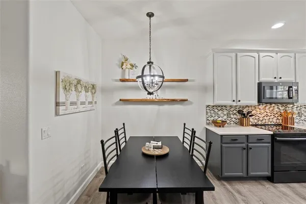 a view of a dining room with furniture
