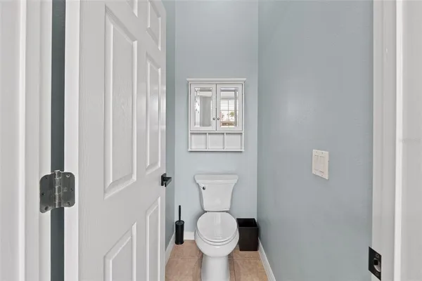 a bathroom with a toilet and a sink