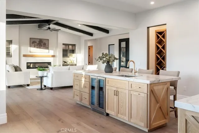 a view of living room with furniture and potted plant