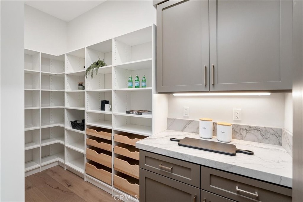 1410 Fire Rock Loop Templeton, CA 93465 - Photo 18 of 64 a view of storage and utility room with wooden floor
