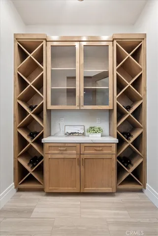 a spacious bedroom with a bed and a window