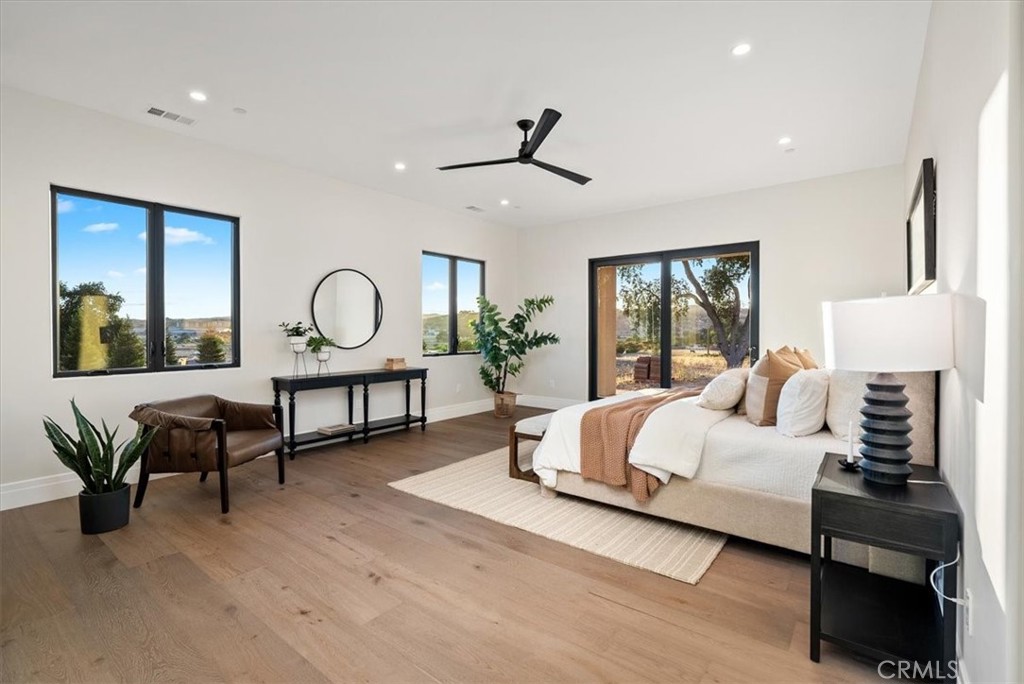 1410 Fire Rock Loop Templeton, CA 93465 - Photo 22 of 64 a bedroom with furniture and a large window