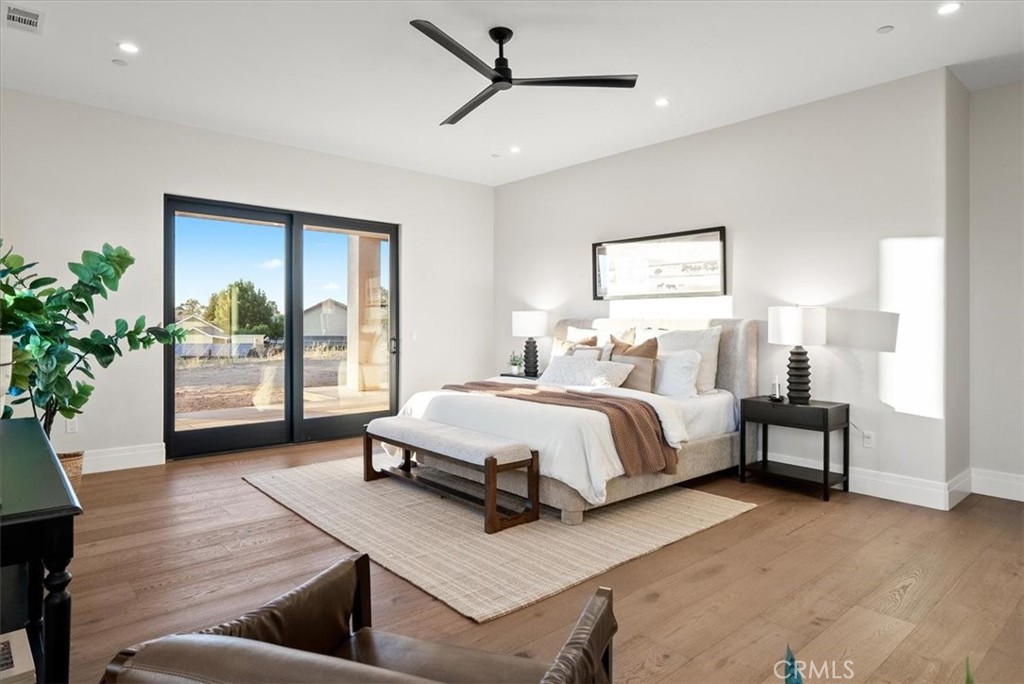 1410 Fire Rock Loop Templeton, CA 93465 - Photo 23 of 64 a spacious bedroom with a bed and a window