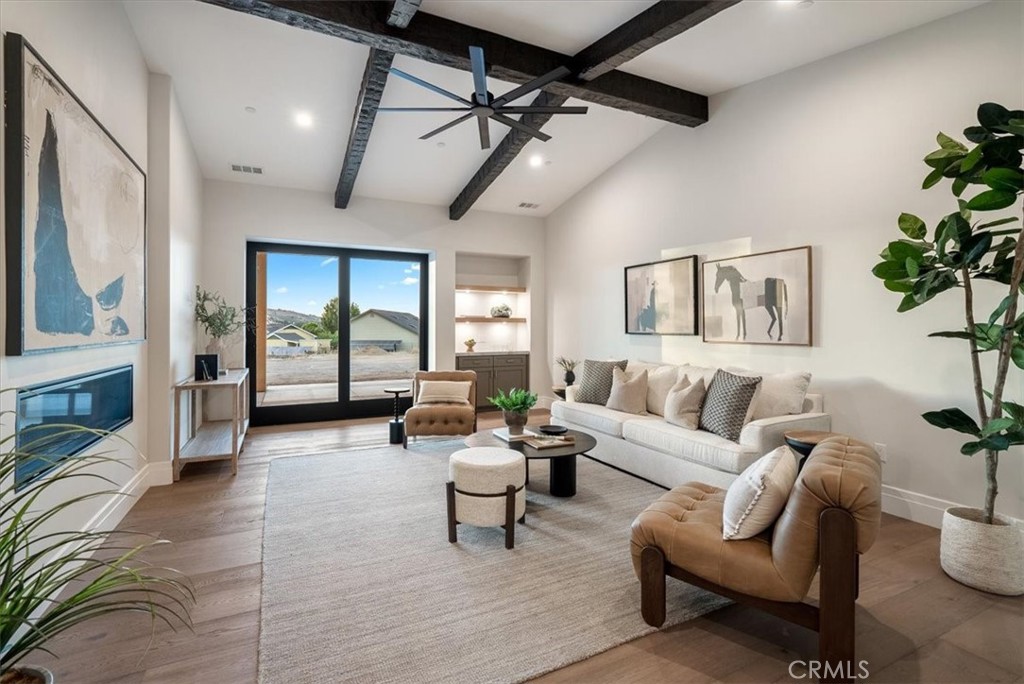 1410 Fire Rock Loop Templeton, CA 93465 - Photo 33 of 64 a living room with furniture and a large window
