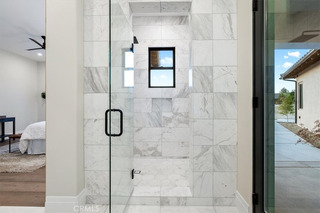 1410 Fire Rock Loop Templeton, CA 93465 - Photo 44 of 64 a bathroom with a bathtub and shower