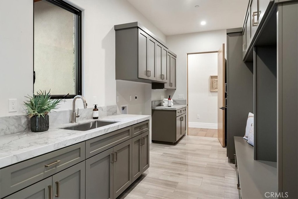 1410 Fire Rock Loop Templeton, CA 93465 - Photo 46 of 64 a kitchen with a sink refrigerator and microwave
