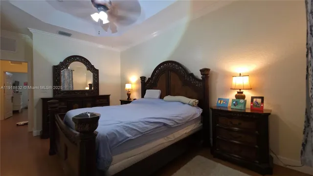 a bathroom with a double vanity sink mirror and toilet