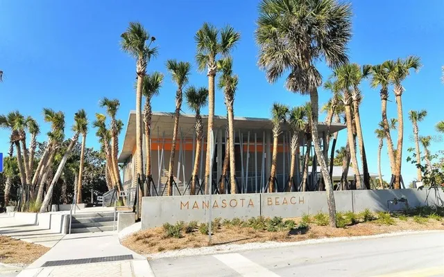 a view of a hallway with windows
