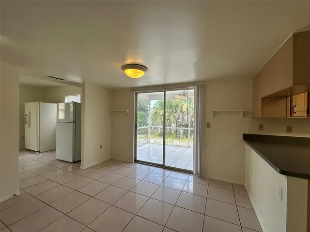 a view of a kitchen with a sink