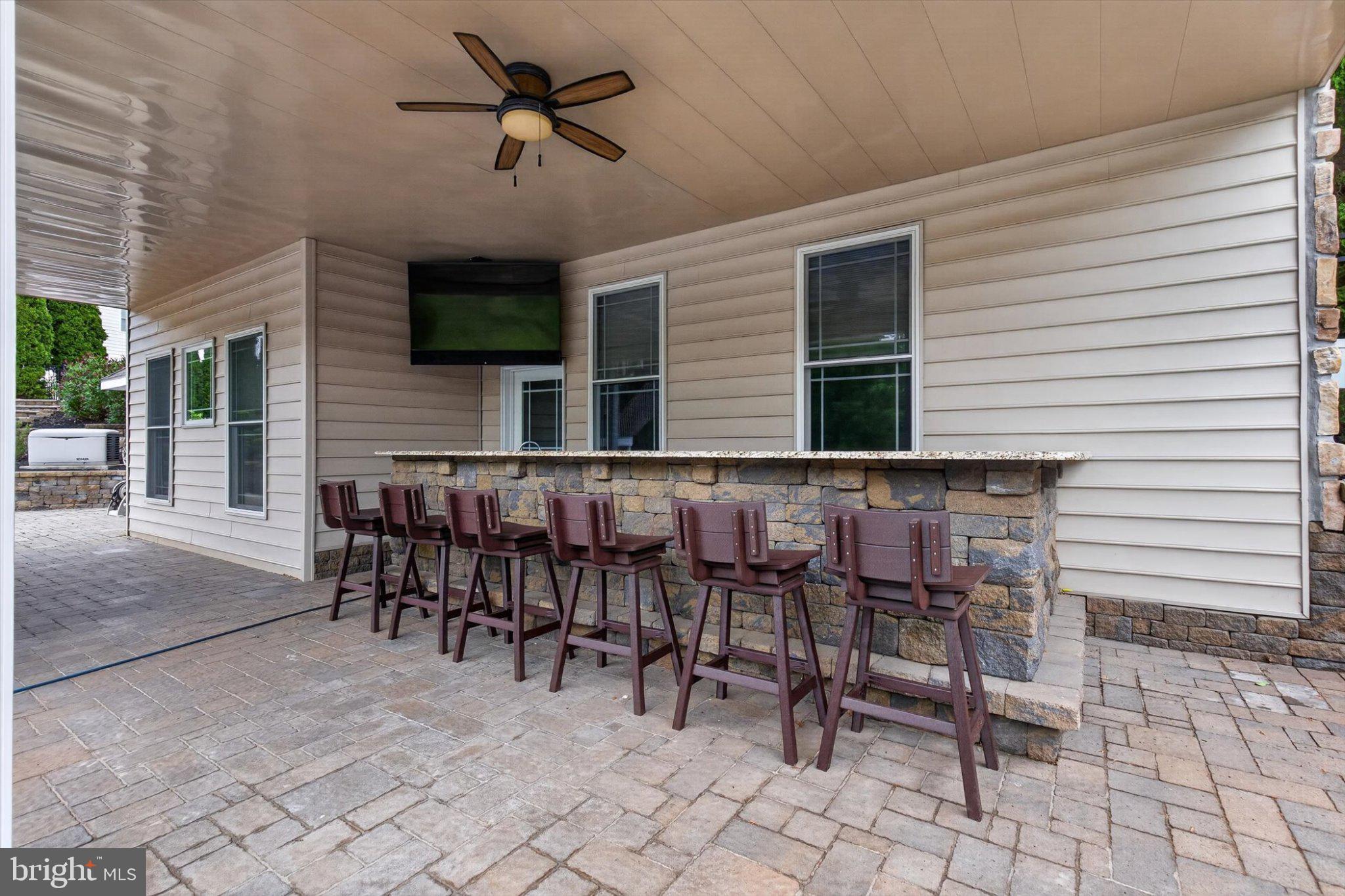 6505 Plowman Ridge Harrisburg, PA 17112 - Photo 63 of 83 Stylish outdoor bar for entertaining.
