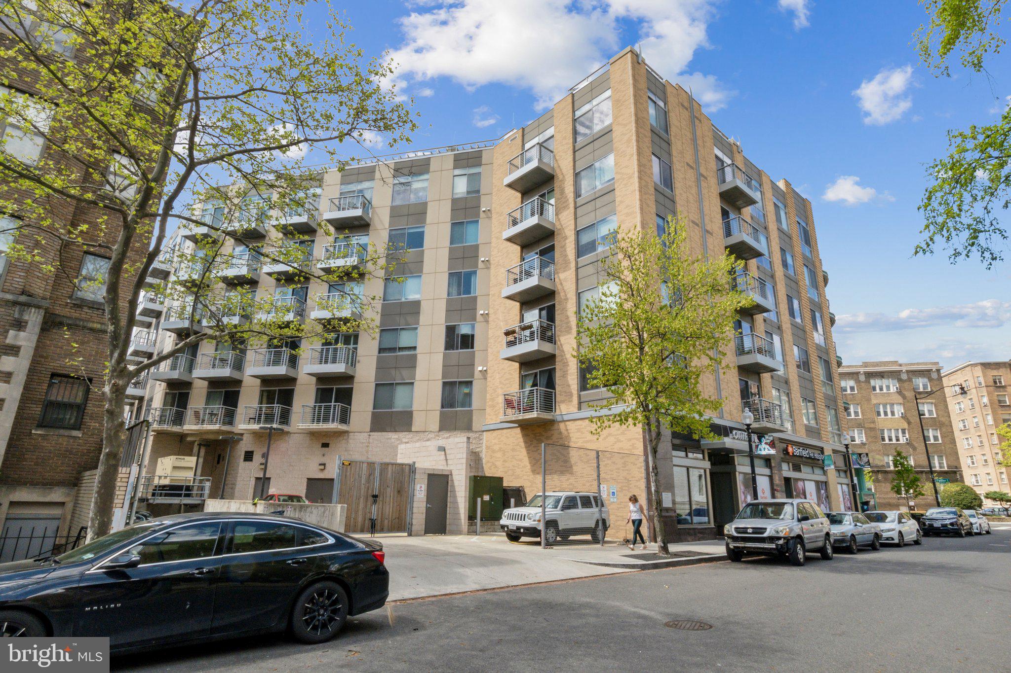 2550 17th Street Northwest, Unit 205 Washington, DC 20009 - Photo 21 of 25 a car parked in front of a building