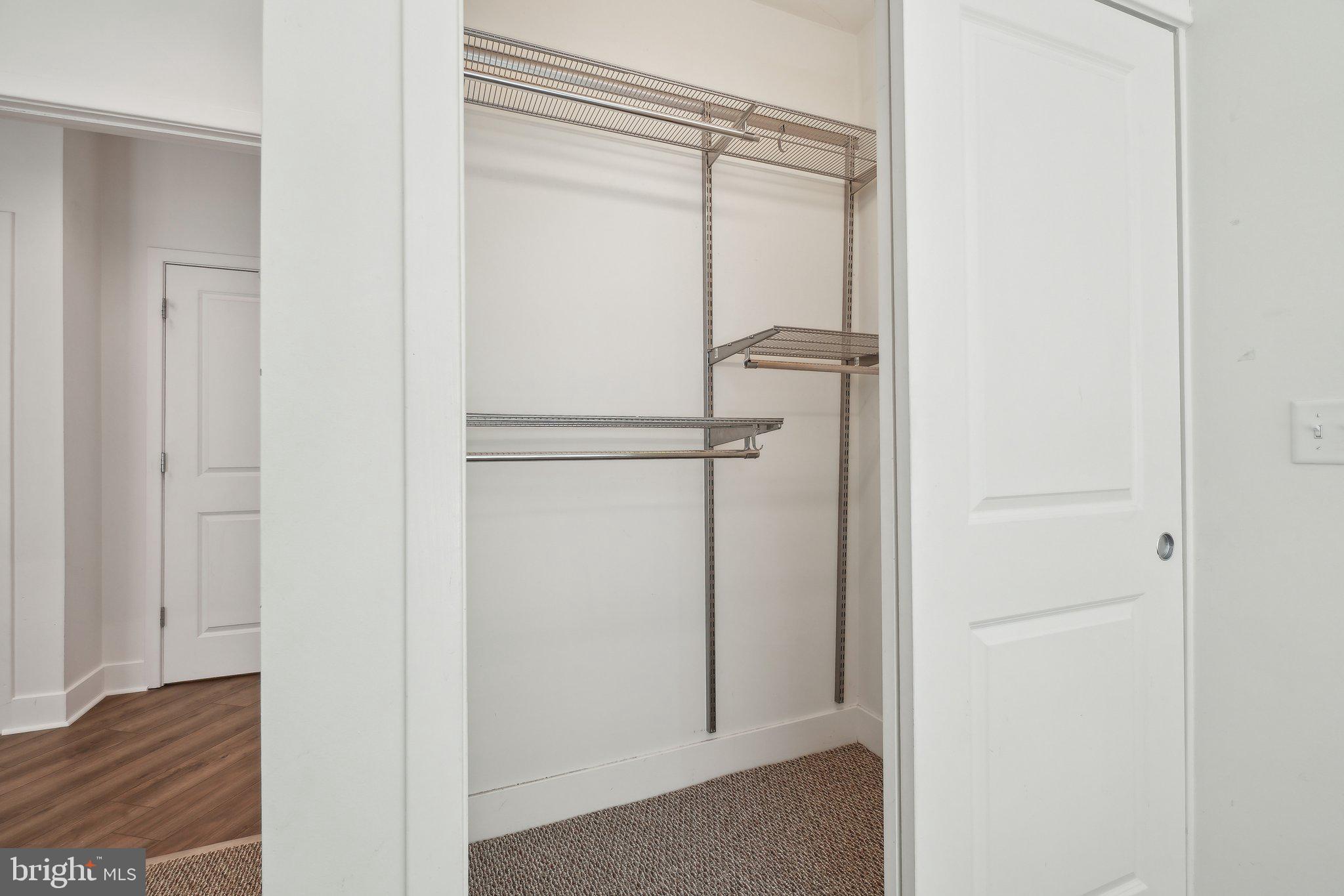 2550 17th Street Northwest, Unit 205 Washington, DC 20009 - Photo 24 of 25 a bathroom with a glass shower door
