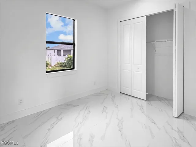 a view of a livingroom and a bathroom