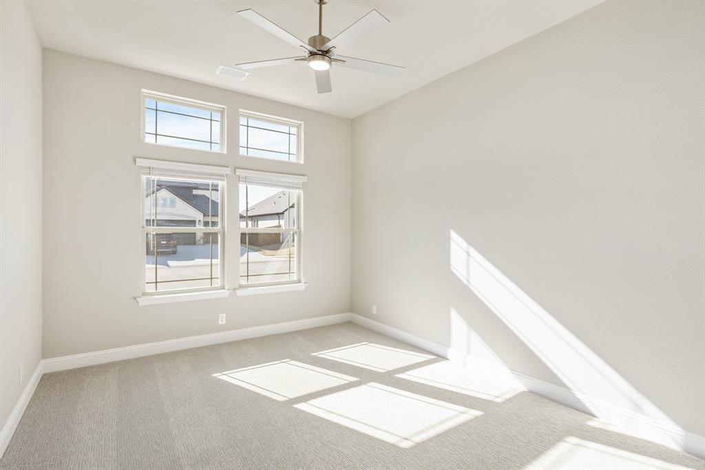 1004 Stonehaven Drive Justin, TX 76247 - Photo 26 of 35 a view of an empty room with a window