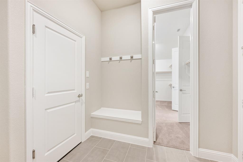 1004 Stonehaven Drive Justin, TX 76247 - Photo 31 of 35 a bathroom with a granite countertop shower