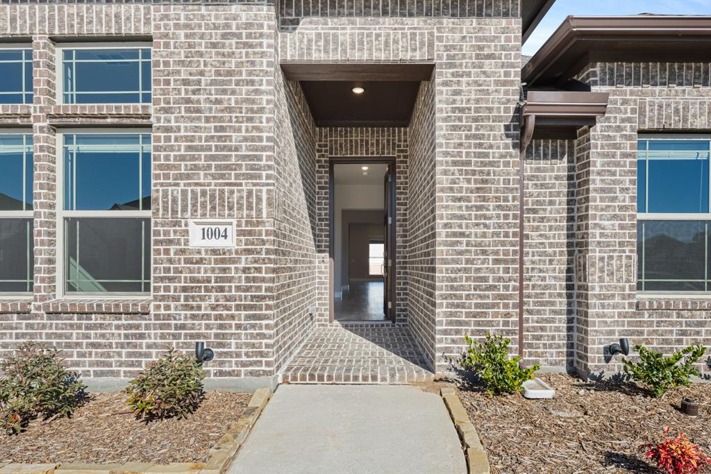 1004 Stonehaven Drive Justin, TX 76247 - Photo 4 of 35 a front view of a house