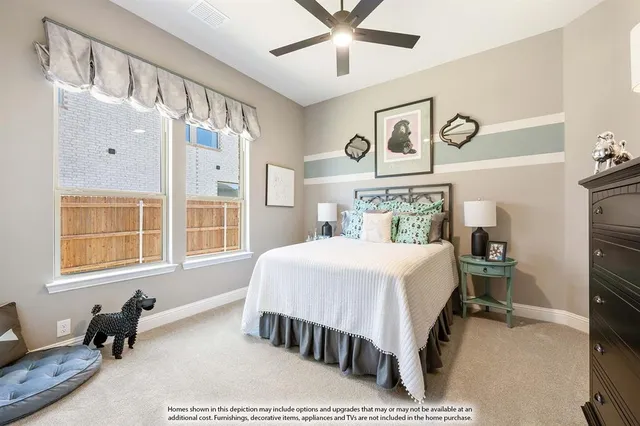 a bedroom with a bed a table and chair with the outer view