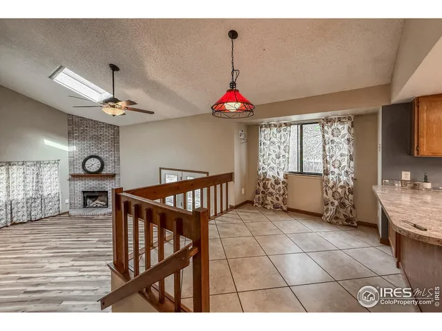 a view of a livingroom with furniture and window