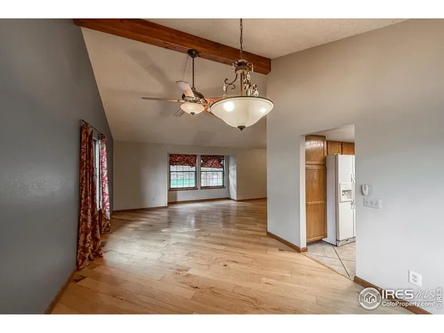 a view interior of a house wooden floor and an entryway