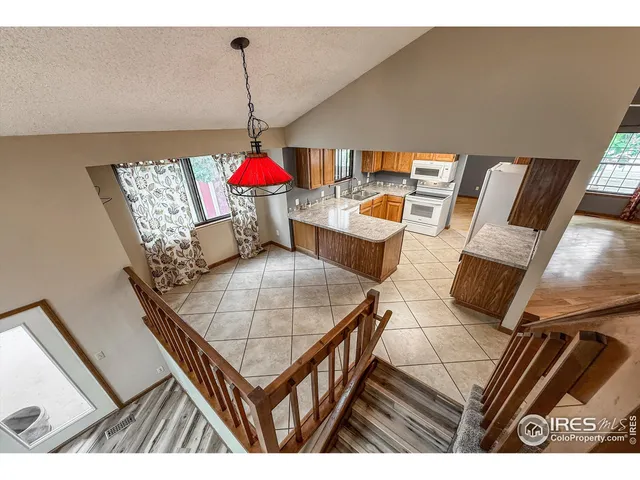a view of a dining room with furniture wooden floor and window