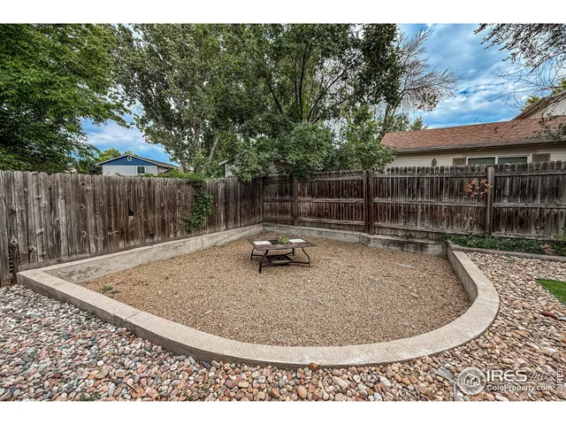 a view of a backyard with a slide