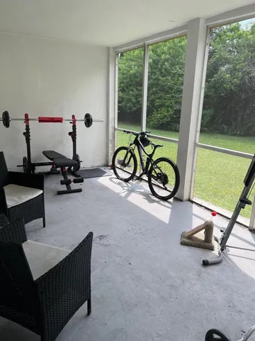 a view of a room with gym equipment