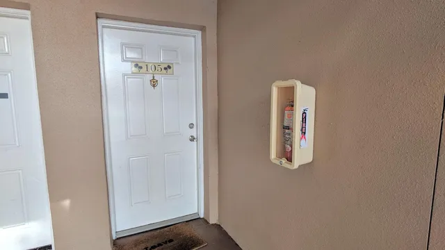 a view of a room with wooden floor and closet