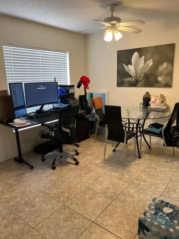 a workspace with furniture and window