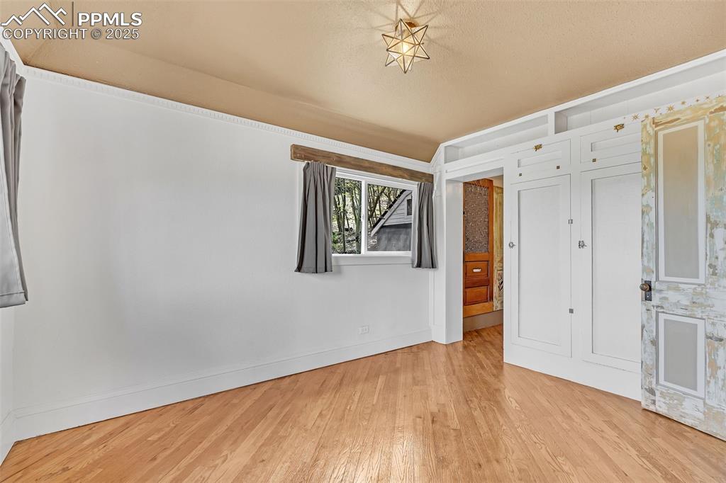 123 7th Street Victor, CO 80860 - Photo 14 of 50 Main Bedroom with entry into large closet and attached 3/4 bath