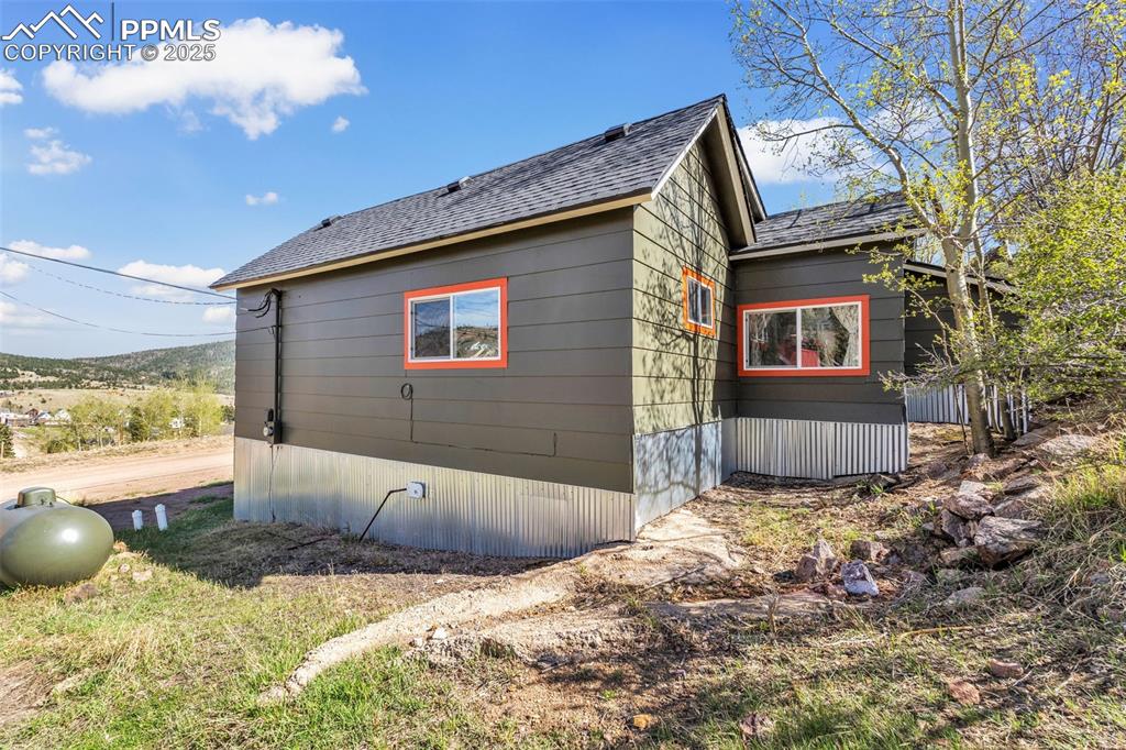 123 7th Street Victor, CO 80860 - Photo 4 of 50 View of home's right side and rear of dwelling