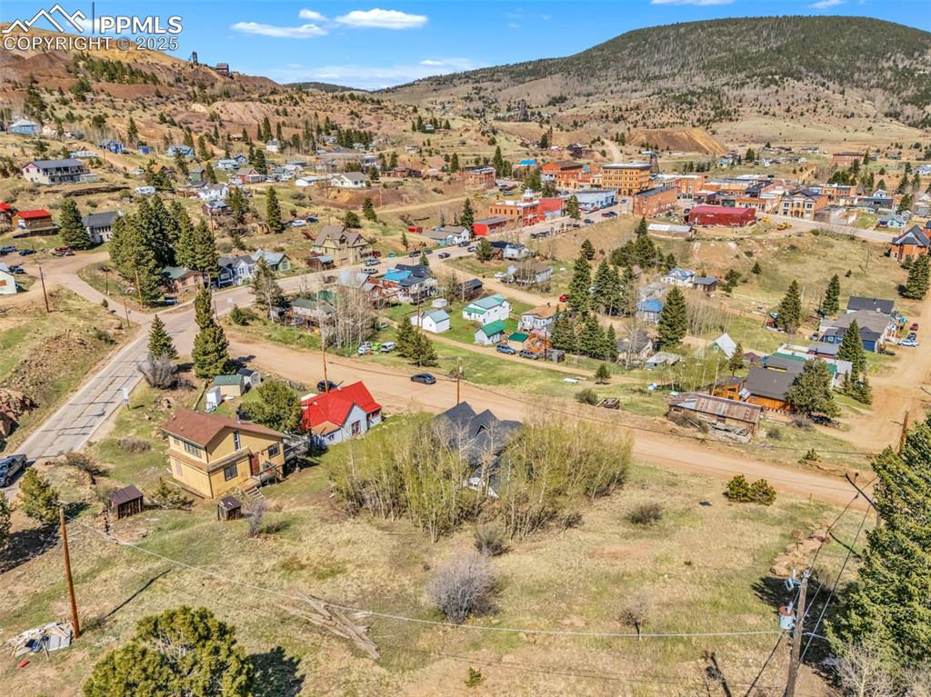 123 7th Street Victor, CO 80860 - Photo 47 of 50 Aerial view of residential area featuring town of Victor and surrounding mountains