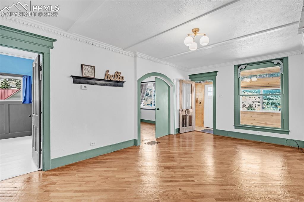 123 7th Street Victor, CO 80860 - Photo 9 of 50 Living room facing front door and 2nd and 3rd bedroom