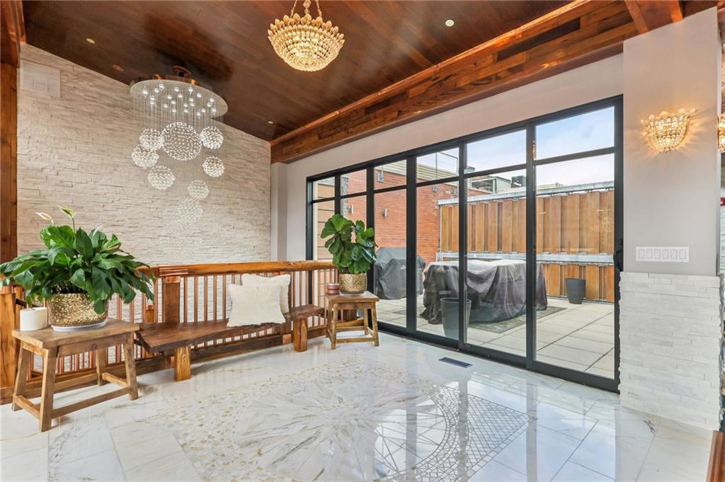 215 25th Street, Unit 7 Pittsburgh, PA 15222 - Photo 18 of 49 a view of a porch with a furniture
