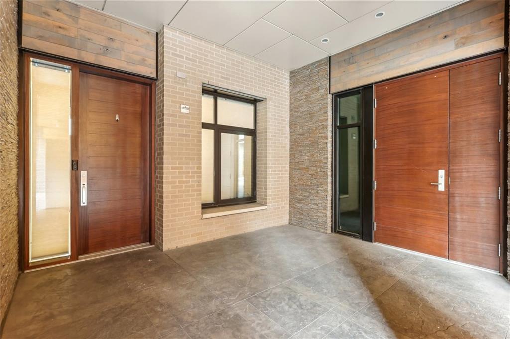 215 25th Street, Unit 7 Pittsburgh, PA 15222 - Photo 2 of 49 a view of an empty room with a window