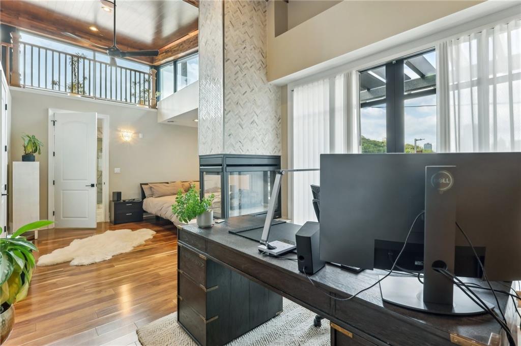 215 25th Street, Unit 7 Pittsburgh, PA 15222 - Photo 21 of 49 a view of a workspace with furniture and a window