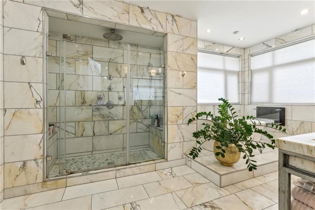 215 25th Street, Unit 7 Pittsburgh, PA 15222 - Photo 25 of 49 a bathroom with a shower