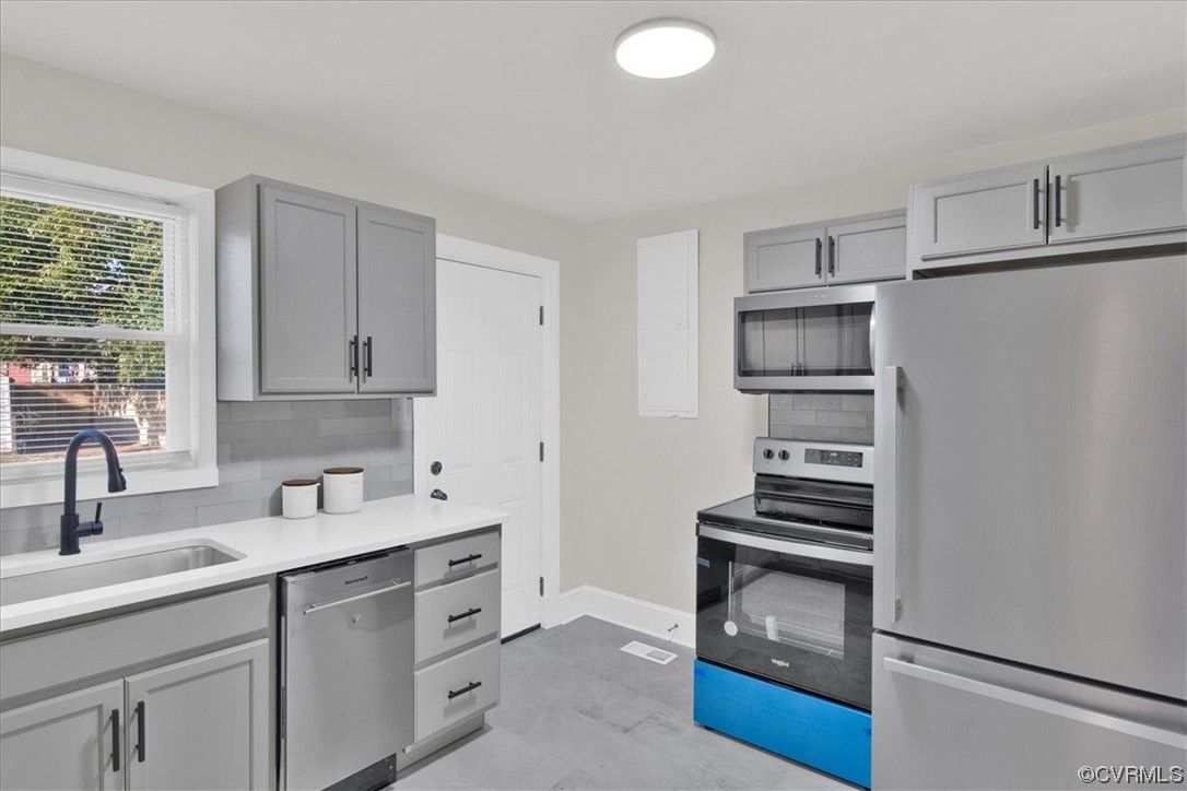 2309 Wright Avenue Richmond, VA 23224 - Photo 11 of 39 a kitchen with cabinets and appliances