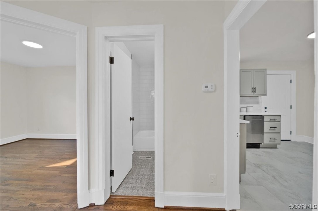 2309 Wright Avenue Richmond, VA 23224 - Photo 23 of 39 a view of a kitchen with a sink and a refrigerator